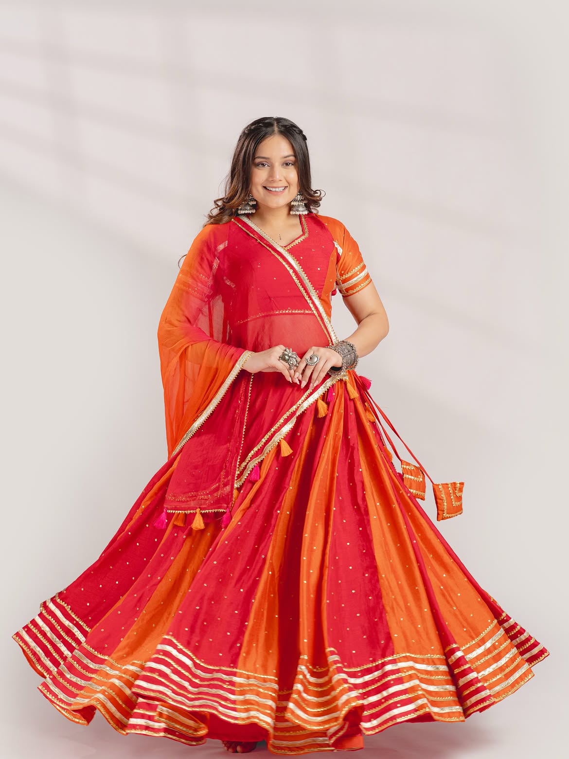 Vibrant Orange & Rani Pink Panel Lehenga Set with Gota Work & Tassel Latkan