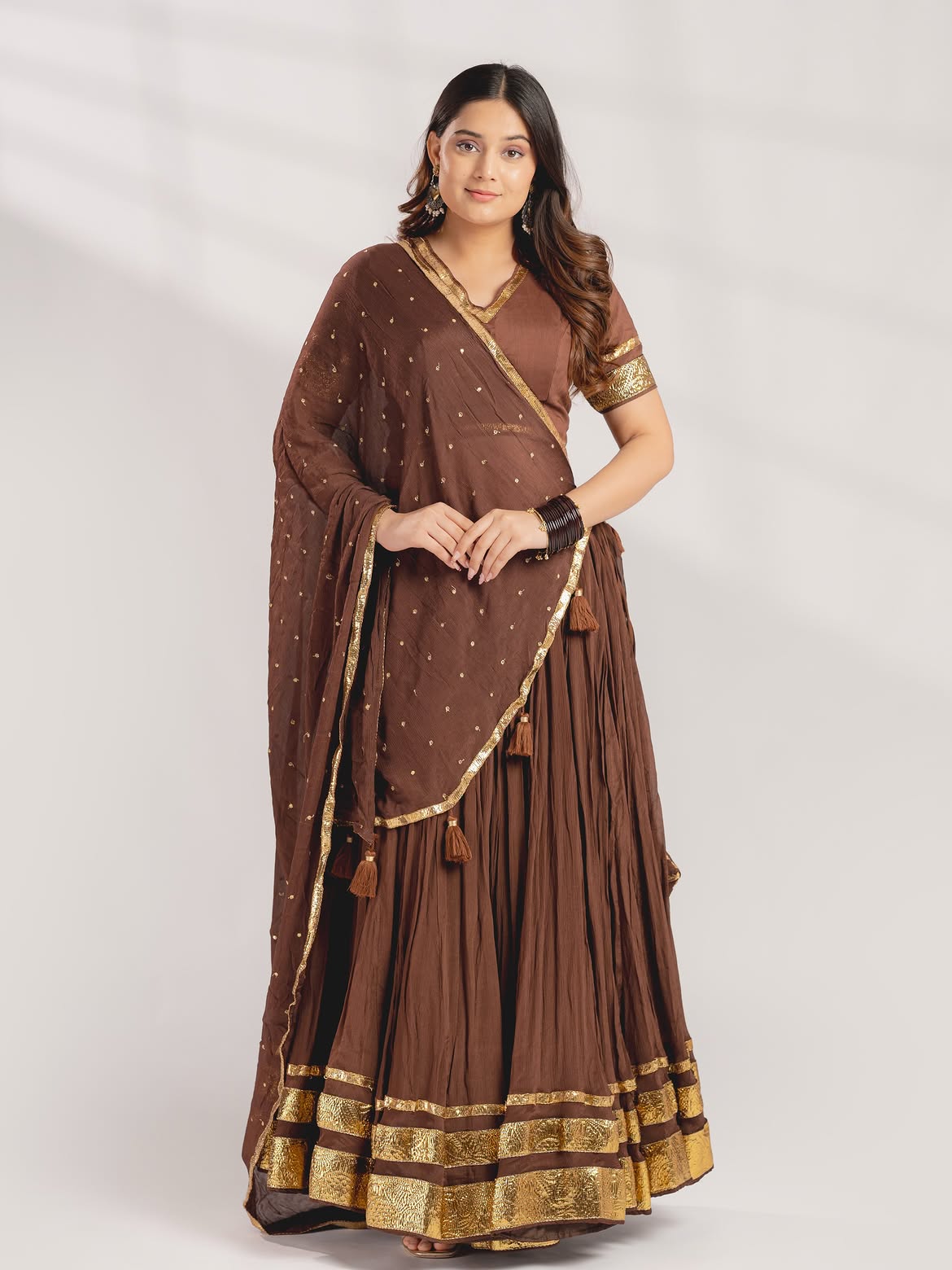 Earthy Chocolate Brown Crushed Lehenga Set with Gold Gota Borders & Tassel Accents