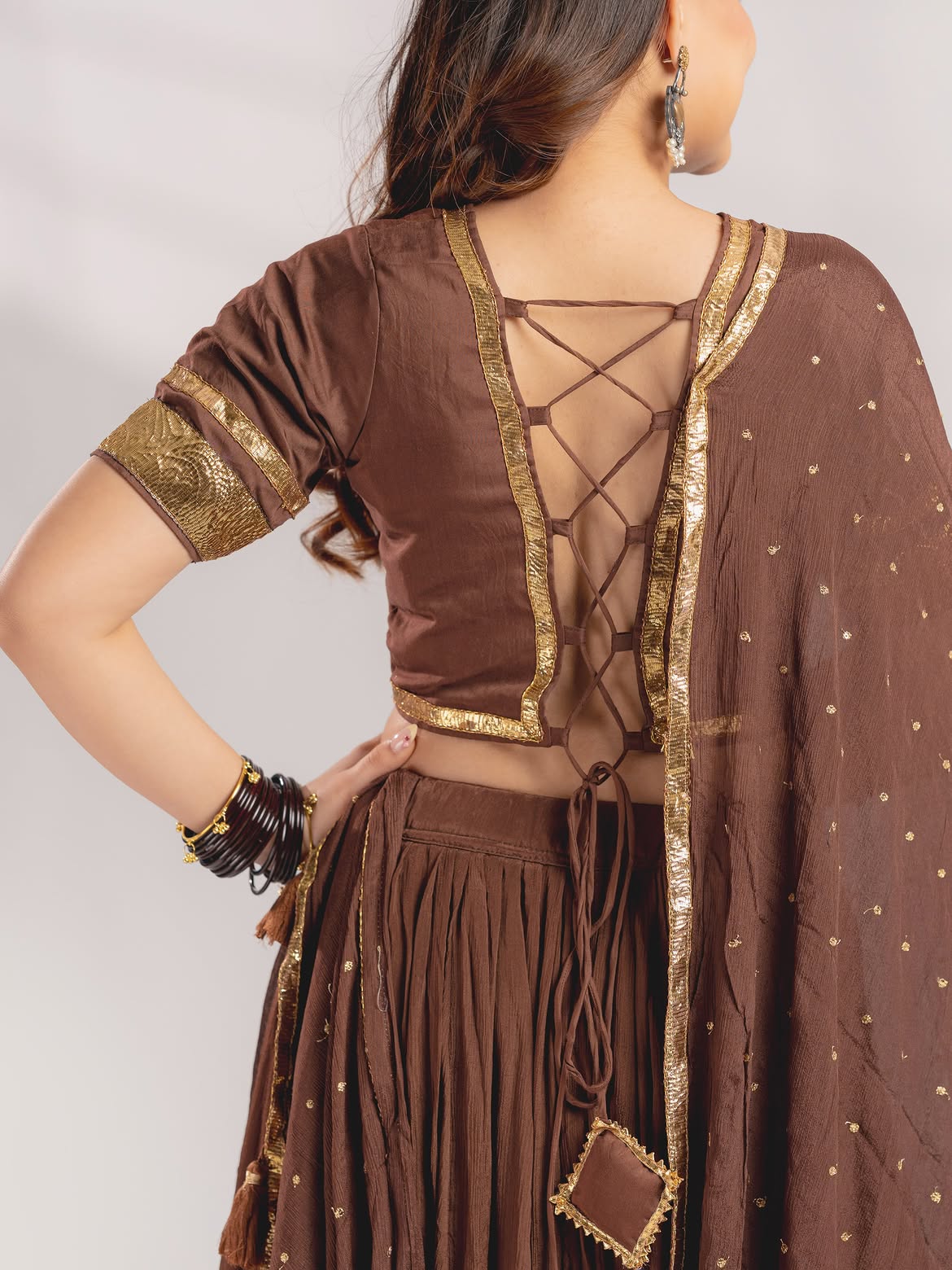 Earthy Chocolate Brown Crushed Lehenga Set with Gold Gota Borders & Tassel Accents
